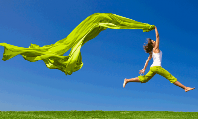 Woman Jumping with green scarf