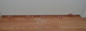 hands under door