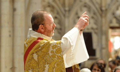 Priest giving homily