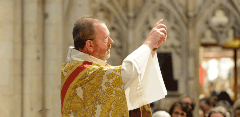 Priest giving homily